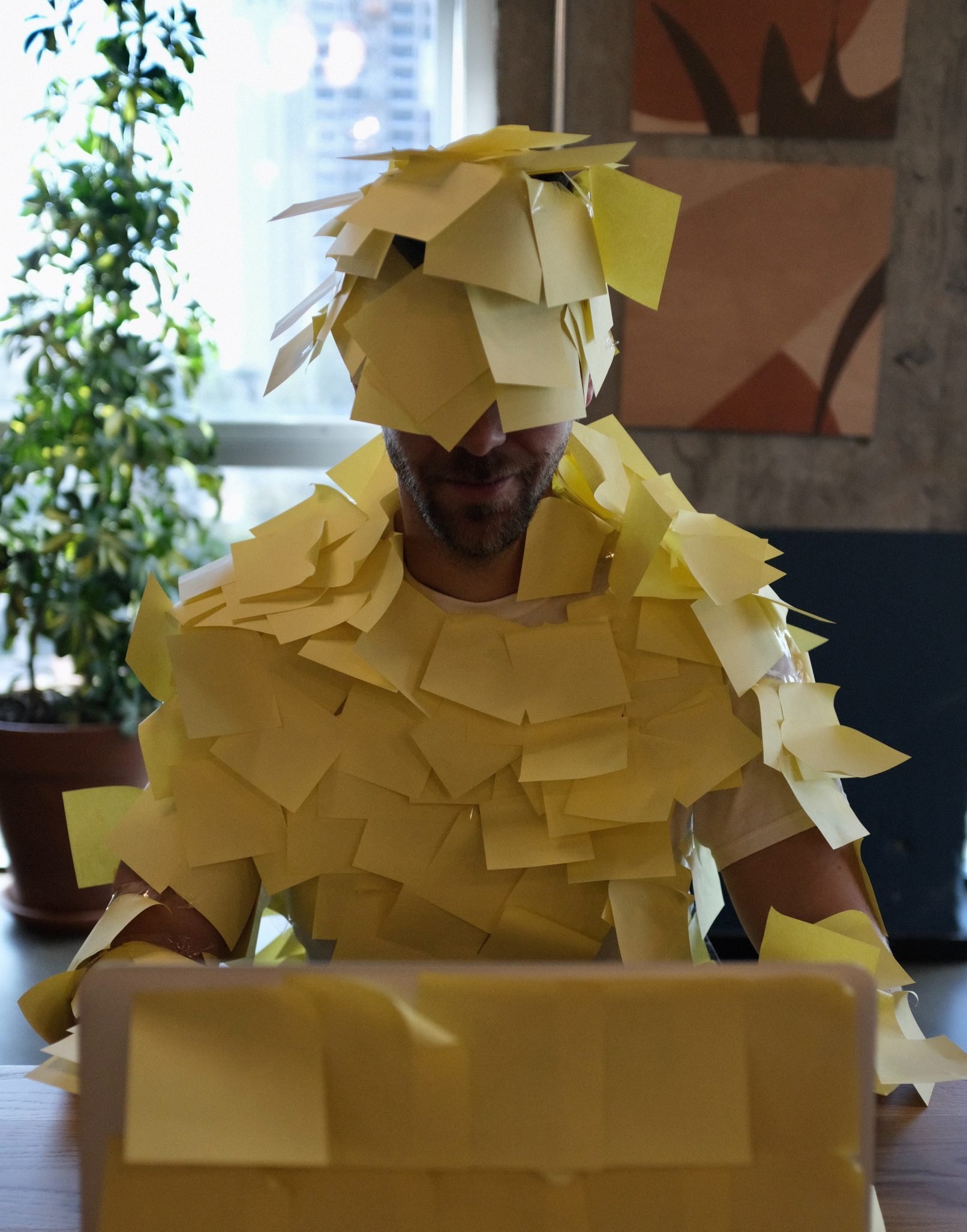A person covered in sticky notes